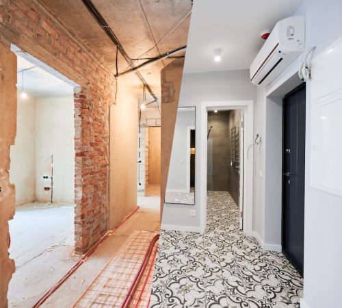 Old apartment with brick walls and new renovated flat with doors, mirror, air conditioner and stylish design in white tones. Inferior of apartment before and after renovation.